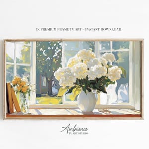 May include: A framed digital art print depicts a sunlit window scene. White hydrangeas in a white vase and yellow flowers in a glass vase sit on a windowsill. The artwork is labeled "4K Premium Frame TV Art - Instant Download."