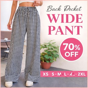 Peut inclure: Pantalon large à carreaux noirs et blancs avec une taille à cordon. Le pantalon est présenté sur une personne. L'image comprend le texte "Back Pocket WIDE PANT" et un cercle rose avec "70% OFF". Tailles XS à 2XL sont listées.