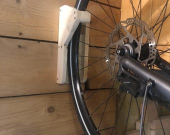 Solid wood wall-mounted bicycle rack