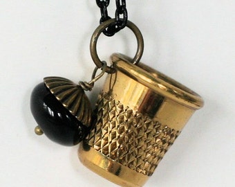 Peter Pan Thimble Kiss With Acorn Kiss Peter Pan and Wendy Jewelry in Black and Brass - Second Star Right