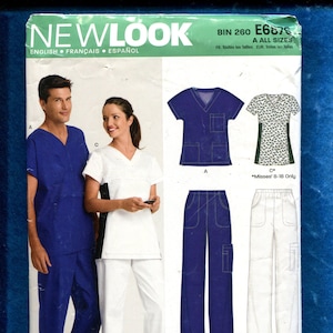 May include: A New Look sewing pattern featuring scrubs. The pattern includes illustrations of a blue scrub top and pants, and a white scrub top and pants. The pattern also shows a patterned scrub top. The cover has the New Look logo and the text "English, Français, Español."