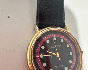 Montre à quartz Seiko 5Y91-0030 vintage 1988 - Cadran noir et rouge - PILE NEUVE