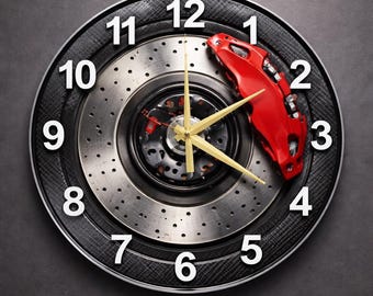 Reloj de cristal redondo / Disco de rueda de Fórmula Uno / Pinza roja, agujas doradas, fondo negro y plateado