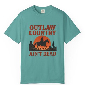 Outlaw Country Ain't Dead T-Shirt - Cowboy Silhouette in Desert Sunset Graphic Tee, Western Vintage Style