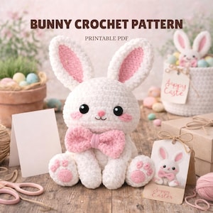May include: A white crochet bunny with pink accents, including the inner ears, bow tie, and paw pads. The image includes the text "BUNNY CROCHET PATTERN" and "PRINTABLE PDF". Additional Easter-themed decorations are visible.