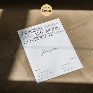 Op de afbeelding: Een witte "Original Artwork Certificate" met zwarte tekst, inclusief titel, artiestgegevens en afmetingen. Het certificaat bevat een handtekening en de tekst "Edit in Canva" in een cirkelvormig ontwerp.