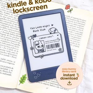 May include: A blue Kindle e-reader shows a custom lockscreen with a bunny library card design. The screen text reads "The Late Night Book Club." A round sticker says "cozy bunny library card instant download."