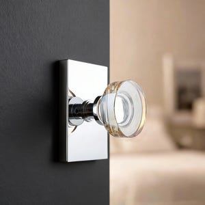 May include: A set of three ceramic mugs with a speckled, matte finish. The mugs are in shades of cream, light gray, and dark gray. Each mug has a simple, minimalist design, perfect for coffee or tea.