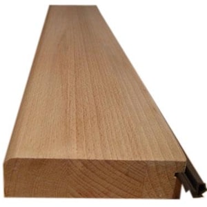 May include: A rectangular, unfinished wooden board with a rounded edge. The wood grain is visible, showing a light brown color. A dark brown, rubber-like strip is attached to one side. The board is approximately 3 inches wide.