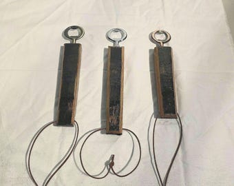 Bourbon barrel stave bottle opener.