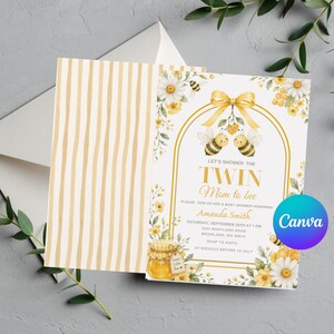 May include: A baby shower invitation card featuring a watercolour design with two bees, a yellow bow, daisies, and a honey jar. The text reads: Let's shower the twin mom to be, Amanda Smith, Saturday, September 26th at 7 PM, 1234 Maryland Road, Woodland, WA 98674, RSVP to Anita at 83232312 before 18 July.