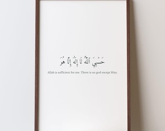 May include: A framed print with Arabic calligraphy and English translation. The dark brown frame surrounds a white background with black text. The Arabic text is above the English translation, which reads, "Allah is sufficient for me. There is no god except Him."