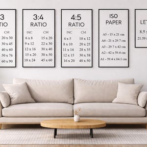 May include: A living room scene featuring a beige sofa, a wooden coffee table, and framed art prints displaying size ratios in inches and centimeters. The prints include 2:3, 3:4, 4:5 ratios, ISO paper sizes, and Letter size (8.5 x 11 inches).