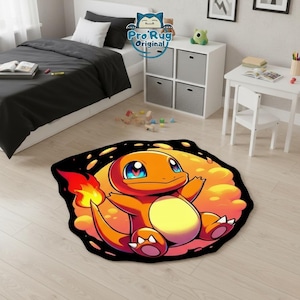 May include: A round, black rug featuring a cartoon Charmander character with orange, yellow, and red colors. The rug has a black border and is placed on a light wood floor. The rug is from Pro Rug Original.