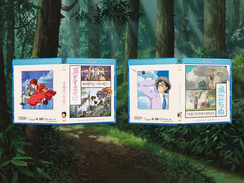 May include: Two Blu-ray cases featuring anime artwork. One case displays a red-clad character and the text "Whisper of the Heart" in Japanese. The other case shows a man in a pink suit and the title "The Wind Rises" in English and Japanese.
