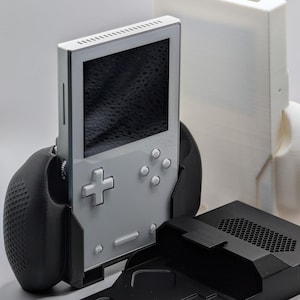 May include: A handmade wooden sign with the text "Welcome" in a playful font. The sign features a distressed white background and a dark brown frame, perfect for a front door or entryway. The sign measures approximately 12 inches wide.