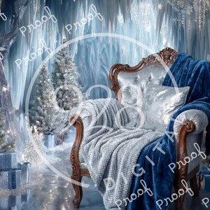 May include: A winter wonderland scene with a vintage armchair draped with a blue blanket and a gray throw. A silver pillow rests on the chair. Two Christmas trees and wrapped gifts are in the background, creating a festive holiday setting.