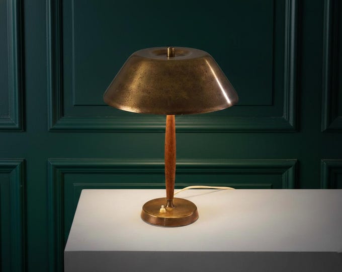 Golden Glow: Mid-Century Mushroom Lamp Against Midnight Blue