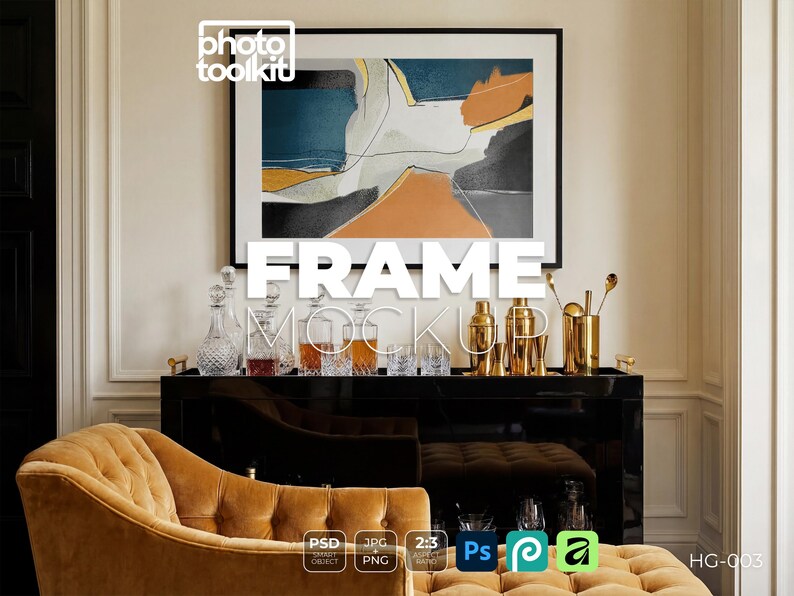 May include: A framed abstract art print with teal, orange, and gray shapes hangs above a black bar cart. The cart displays glassware, decanters, and gold bar tools. A tufted gold sofa is in the foreground. The image includes the text "FRAME MOCKUP".