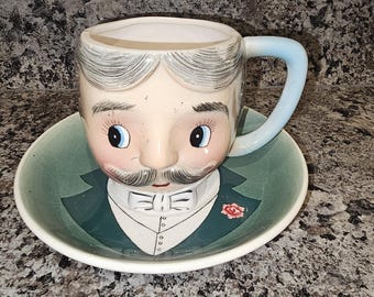 Taza/platillo vintage PY con cara de hombre con bigote, fabricado en Japón.