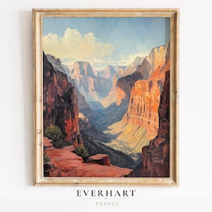 May include: Framed landscape painting depicting a canyon scene with red rock formations and a blue sky with clouds. The artwork is in a gold-colored frame. The text "EVERHART PRINTS" is printed at the bottom of the image.