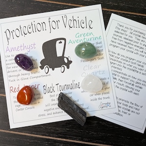 May include: A collection of crystals for vehicle protection, including amethyst, green aventurine, red jasper, clear quartz, and black tourmaline. The image includes a card with a car graphic and text about crystal placement.