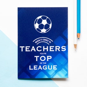 May include: A blue card with a white soccer ball graphic and the text "When it comes to teachers you're top of the league".
