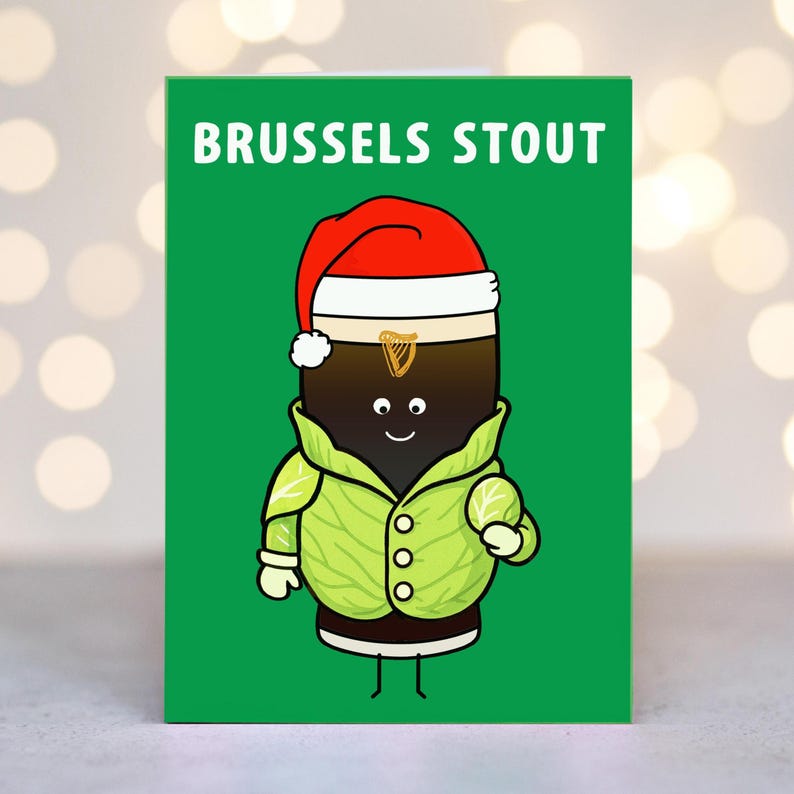 May include: A green greeting card with the words "BRUSSELS STOUT" at the top. The card features a cartoon stout character wearing a Santa hat, a green jacket, and white gloves. The stout has a smiling face.