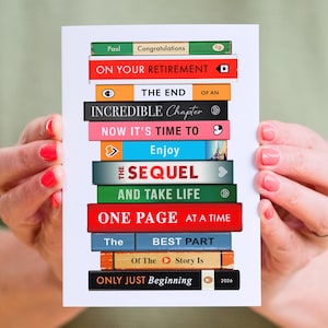 May include: A greeting card featuring a stack of colourful book spines with the text: Paul Congratulations ON YOUR RETIREMENT THE END OF AN INCREDIBLE Chapter NOW IT'S TIME TO Enjoy THE SEQUEL AND TAKE LIFE ONE PAGE AT A TIME The BEST PART Of The Story Is ONLY JUST Beginning 2026.