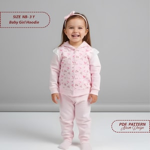 May include: A baby girl's pink hoodie and pants set. The hoodie has a floral pattern and white lace trim. The set is designed for sizes NB-3Y. The image also includes the text "Baby Girl Hoodie" and "PDF Pattern Naum Design".