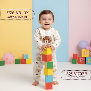 May include: A baby in a three-piece bear-themed outfit, playing with colourful wooden blocks. The set includes a jacket, shirt, and trousers. The image text reads "SIZE NB - 3Y Baby 3 Piece set". The blocks are approximately 5 cm each.