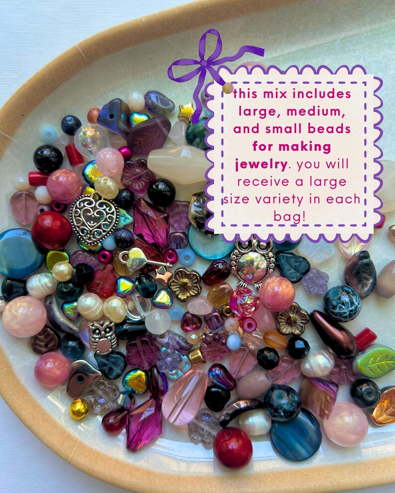 May include: A collection of assorted beads in various shapes, sizes, and colors, including pink, purple, blue, and metallic tones. A white scalloped sign with a purple bow contains the text: this mix includes large, medium, and small beads for making jewelry. you will receive a large size variety in each bag!