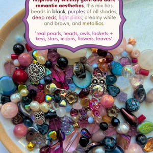 May include: A collection of assorted beads and charms including real pearls, hearts, owls, lockets, keys, stars, moons, flowers, and leaves in black, purple, red, pink, white, brown, and metallic tones, with text describing the mix.