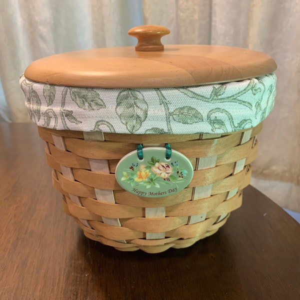 Longaberger At Home Flora Plant Basket with Garden Liner Plastic Protector, Tie On, and Woodcrafts Lid. Excellent used condition. 8x6.5 2004