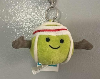 Green Smiley Plush Keychain with Winter Ear Flap Hat – Kawaii Mini Plush Bag Charm