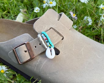 Birkenstock Boston charms with a shell