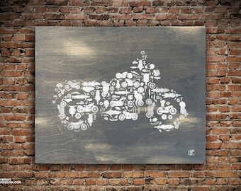 Collage de motocicletas, motos, choppers, motos de cross y piezas sobre panel de madera.