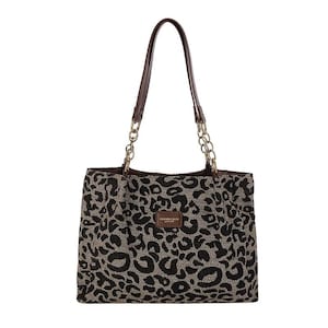 May include: A tote bag featuring a black and tan leopard print pattern. The bag has two brown shoulder straps connected by gold-toned metal chains. A small rectangular brown patch on the front displays the text FASHION & BAGS LEATHER.