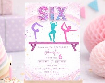 May include: A birthday invitation on a small wooden easel. The invitation features the word "SIX" in glittery letters above three gymnast silhouettes. The text reads "Join us to celebrate Amelia turning 6" with event details.