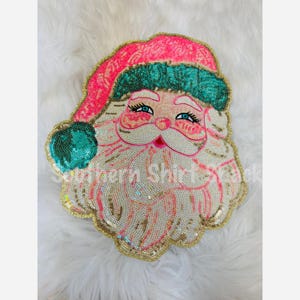 Parche termoadhesivo de Papá Noel rosa con lentejuelas. Parche navideño termoadhesivo. Parche grande termoadhesivo con lentejuelas. Parche termoadhesivo de Papá Noel.