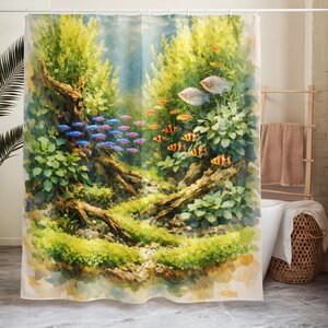 May include: A watercolor-style shower curtain featuring an underwater scene with colorful fish and lush green plants. The design includes blue, orange, and striped fish swimming among the foliage, creating a vibrant and aquatic theme.