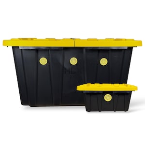 May include: Two black storage bins with yellow lids. The larger bin has the text "HDX 27G" printed on the side. Both bins have yellow circular vents. The bins are designed for storage.