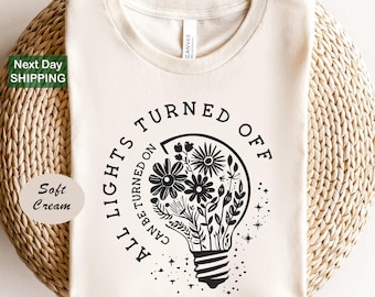 Camiseta "Apagar todas las luces se puede encender", camiseta de salud mental, camiseta motivacional, camiseta de amor propio, vibras positivas, camiseta floral de salud mental