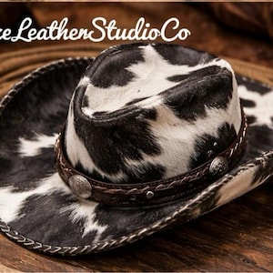 May include: A set of three ceramic mugs with a speckled, matte finish. The mugs are in shades of cream, light gray, and dark gray. Each mug has a simple, minimalist design, perfect for coffee or tea.