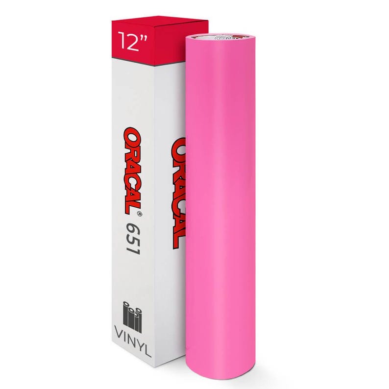 May include: A roll of bright pink vinyl next to a white box with the text "ORACAL 651" and "VINYL". The box has a red top with the number "12" printed on it, indicating a 30.48 cm roll.