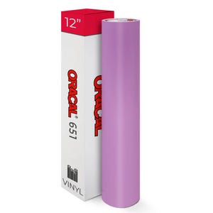 May include: A roll of lavender vinyl next to a white box with red accents. The box is labeled "ORACAL 651" and "12" inches. The vinyl roll is approximately 30 cm in length.