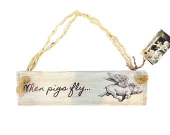Hanging Sign With "When Pigs Fly..." Text