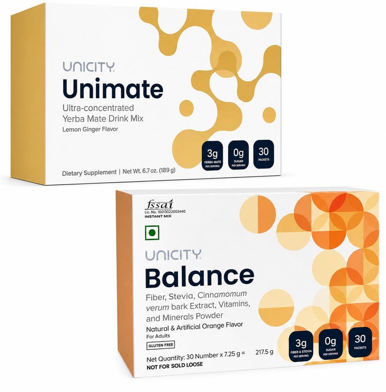 Op de afbeelding: Twee dozen Unicity voedingssupplementen. De bovenste doos is Unimate, een ultra-geconcentreerde Yerba Mate drankmix met Lemon Ginger smaak. De onderste doos is Balance, met vezels, stevia en vitamines. Beide dozen bevatten 30 zakjes.