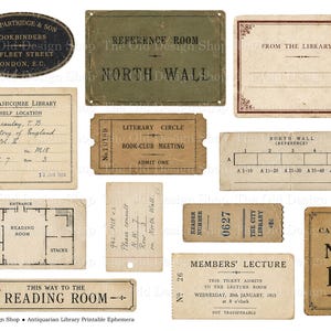 May include: A collection of vintage-style paper ephemera featuring library-themed labels, tickets, and signs. Items include a bookbinder oval label, a reference room sign, library cards, a floor plan, and admission tickets with aged, tan paper textures.