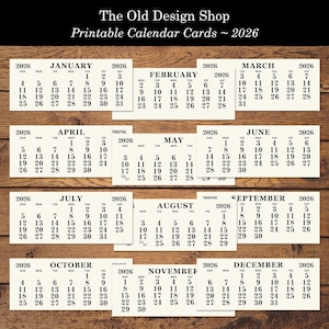 Puede incluir: Tarjetas de calendario imprimibles para 2026. Cada mes se muestra en una tarjeta separada, con los días y las fechas claramente visibles. El logotipo de The Old Design Shop está en la parte superior. Diseño práctico.